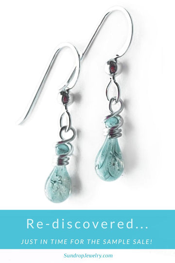 Re-discovered just in time for the sample sale, these tiny cyan with fine threads of black glass earrings are one-of-a-kind!