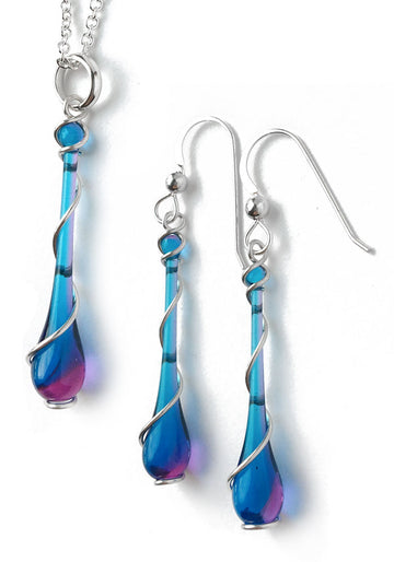 Five new matching jewelry sets are now available in my shop at http://SundropJewelry.com , like this earring and pendant necklace set of two-toned turquoise and magenta glass teardrops with a spiral twist of sterling silver.